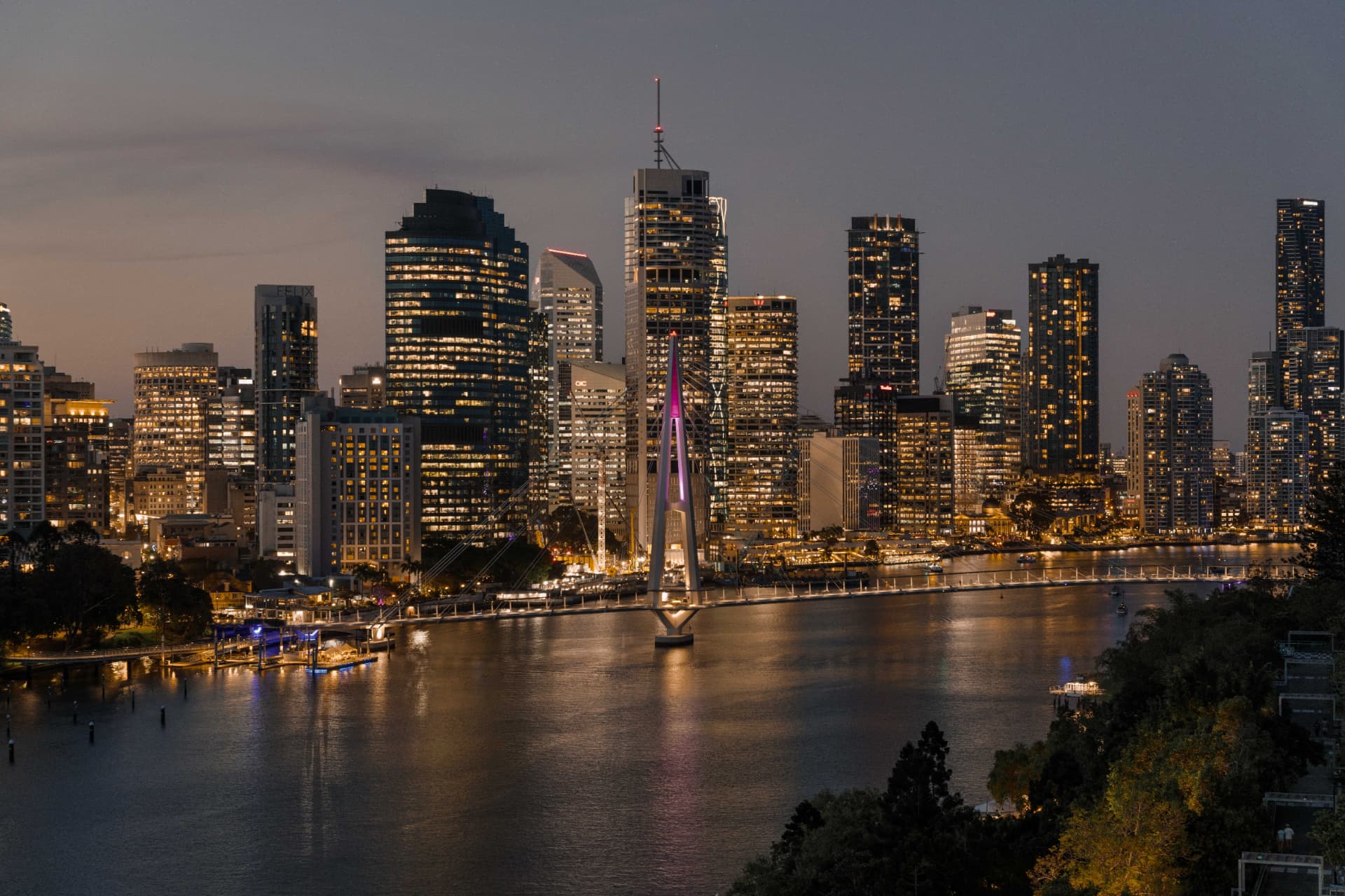 Brisbane city skyline and river at night seen from Kangaroo Point